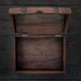 Vintage,Open,Chest,Close,Up,On,Dark,Wooden,Table,,Top