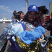 Lampedusa-NIHMP-cultural-mediator-with-a-newborn-just-arrived-on