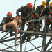 naked-mentally-ill-woman-climbs-transmission-tower-tianjin-china