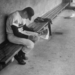 Baseball player Billy Joe Davidson sitting alone in the dugout r