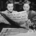 Two women reading a newspaper in the Congressional Library's New