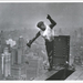 Worker-on-Empire-State-building-signaling-the-hookman-1931-520x4