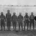Soccer team of British soldiers with gas masks, World War I, som