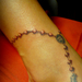 rozsafűzér lábra tattoo