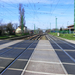 A végponti oldalon lévő vasúti átjárón állva,balról jobbra:Győr 